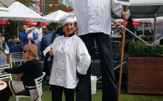 Italian waiters / chefs on stilts